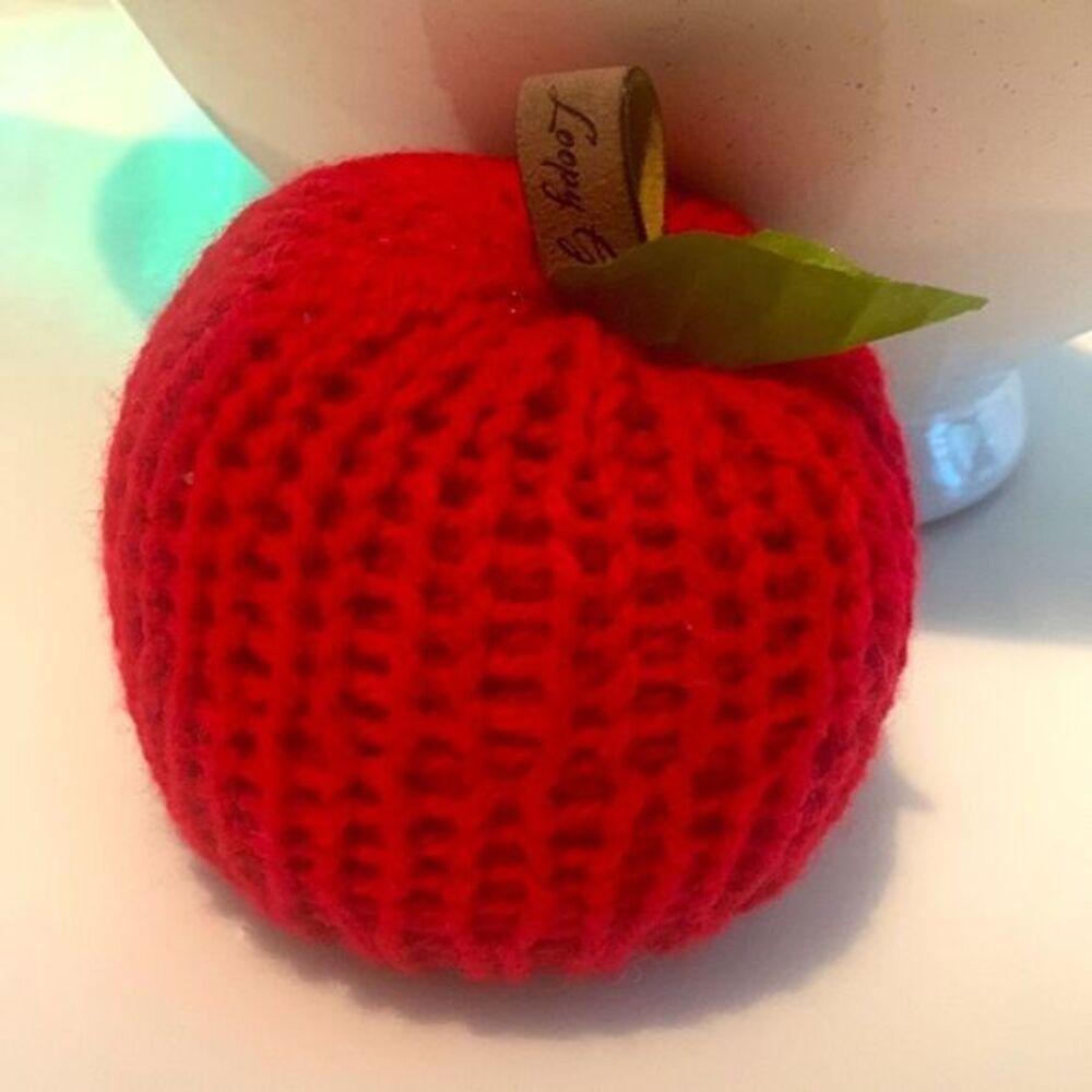 Hand knit apple shelf sitter